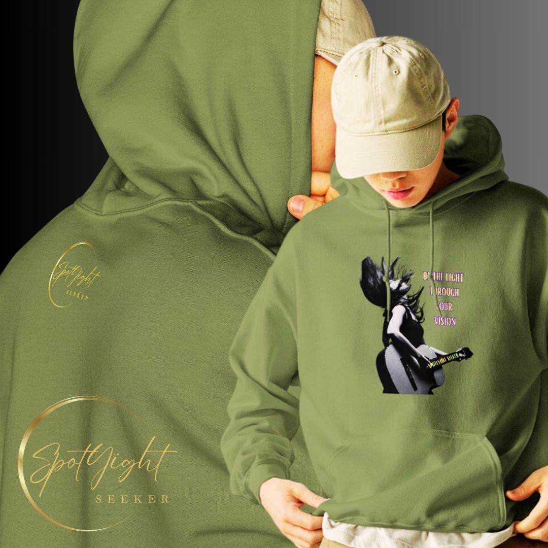 A stylish black and white Heavyweight Be the Light Unisex Hoodie displayed against a backdrop of creativity. The bold graphics symbolize authenticity, inviting artists to embrace their vision and be the light for their audience.