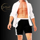 LBS Men's Swim Trunks - Stylish and confident male artist wearing vibrant swim trunks by SpotlYght Seeker