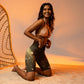 Female artist shine bright rocking your Gold Spotlyght Biker Shorts