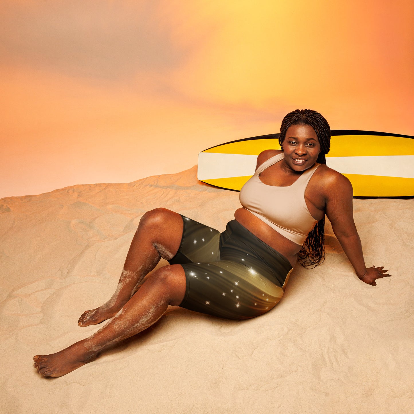 Female artist shine bright rocking your Gold Spotlyght Biker Shorts