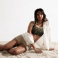 Female artist shine bright rocking your Gold Spotlyght Padded Sports Bra
