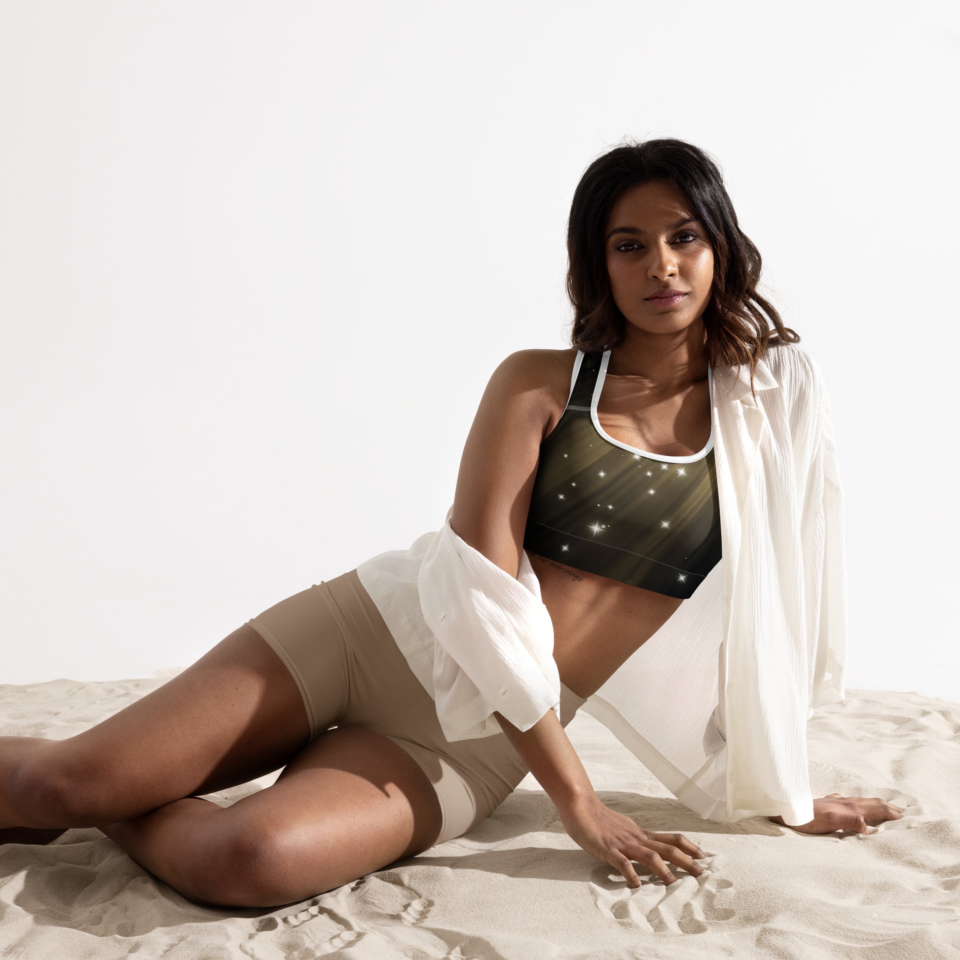 Female artist shine bright rocking your Gold Spotlyght Padded Sports Bra