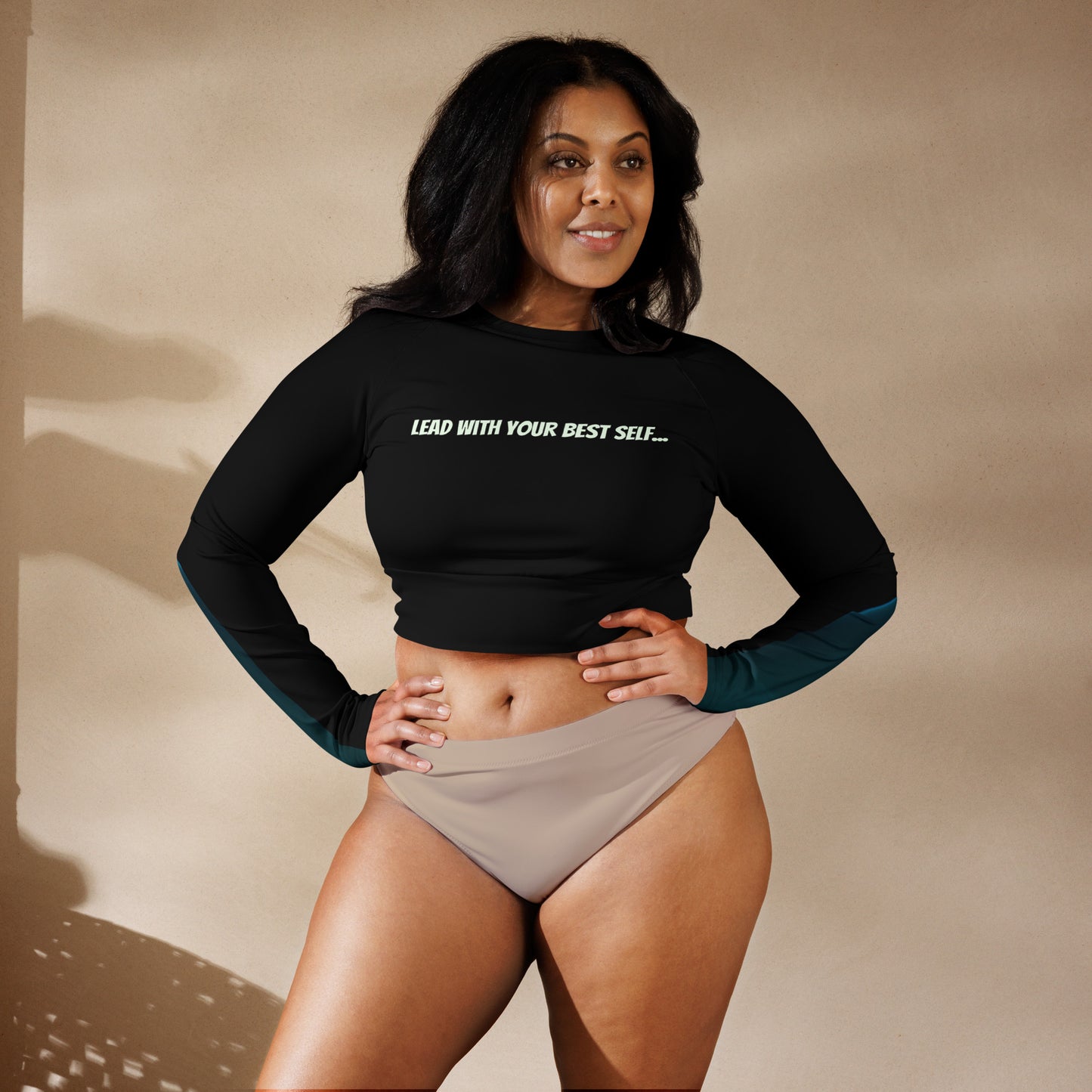 See yourself in the Spotlight in this LBS Women's Aqua Spotlight Long Sleeve Plus Size Crop Top.