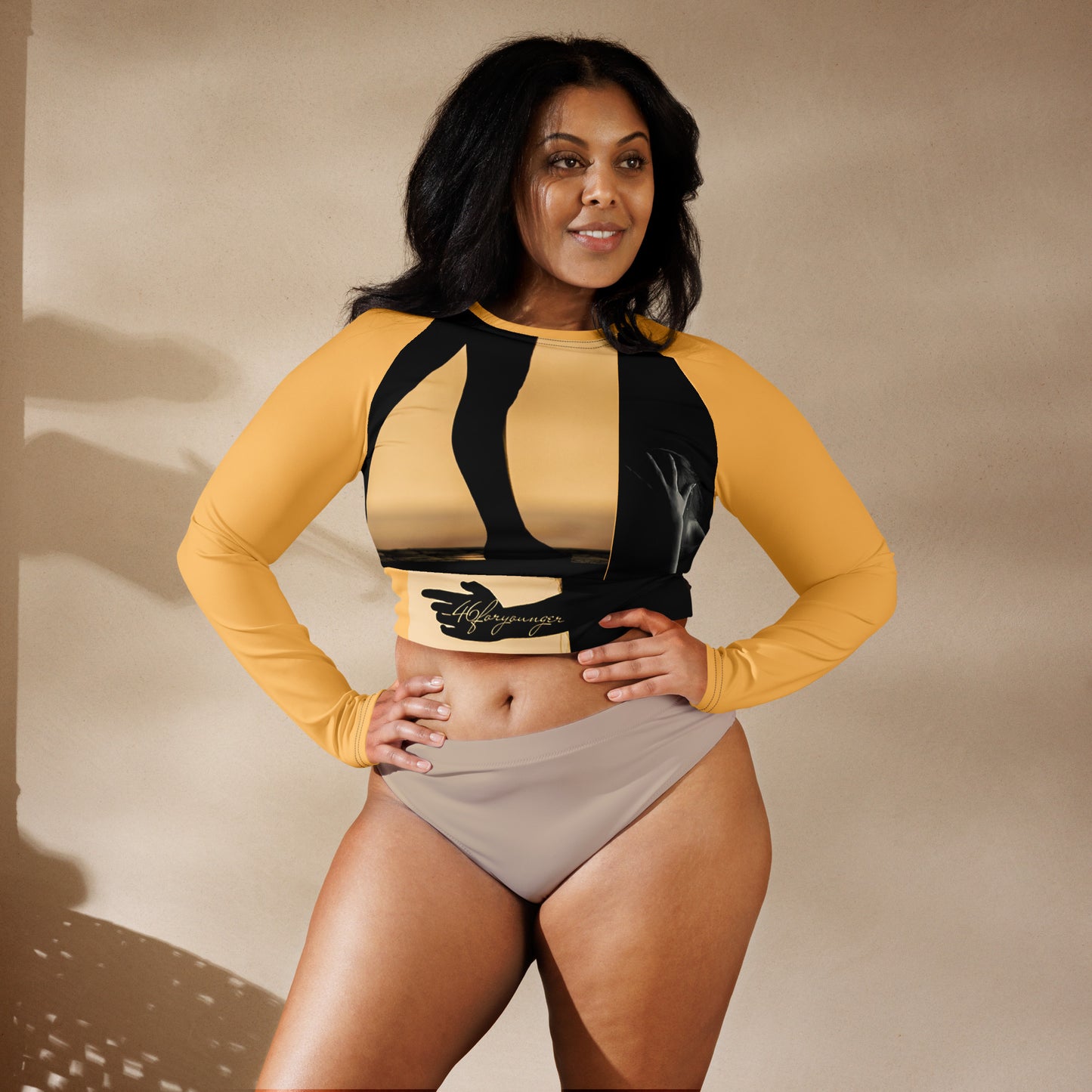 A-Ray of Emotions Long Sleeve Crop Top - AH Chardonnay: A canvas for creativity and artistic elegance, inspired by the profound quote, in the stunning Chardonnay color.