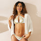 ☀️ Embrace the Sunlit Rebellion ☀️ Unleash Your Inner Beach Siren ✨  Dive into the rebellion with our Rebel Artist Sting Bikini in stunning white. The design is a fusion of freedom and artistic expression – it's not just swimwear, it's a statement of confidence.
