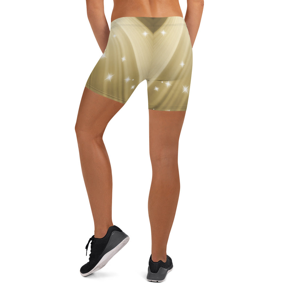 Female artist shine bright in the spotlight while rocking your Gold Spotlyght Short Shorts.  Elevate your style and confidence with our statement fashion for artists.