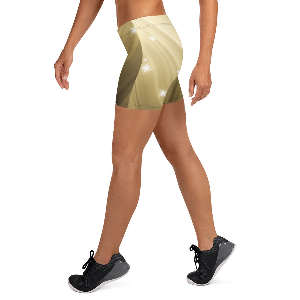 Female artist shine bright in the spotlight while rocking your Gold Spotlyght Short Shorts.  Elevate your style and confidence with our statement fashion for artists.