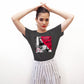 A bold and stylish Unisex Artist Vulnerable Warrior T-Shirt in Classic design, specifically crafted for Female Artists The shirt features empowering graphics, celebrating authenticity on stage and fierce warrior strength off stage. Perfect for making a statement in the world of art and beyond. Dark Heather Grey.