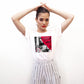 A bold and stylish Unisex Artist Vulnerable Warrior T-Shirt in Classic design, specifically crafted for Female Artists The shirt features empowering graphics, celebrating authenticity on stage and fierce warrior strength off stage. Perfect for making a statement in the world of art and beyond. White Tee Plus Sizes Available.