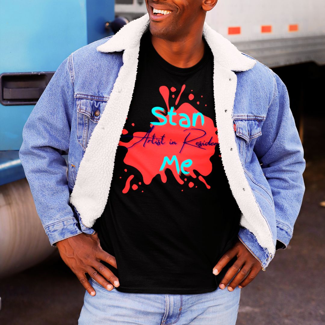 “Stan Me, Artist in Residence” tees featuring paint splatter designs, blending artistic creativity with stan culture. Available in 8 unique styles. Perfect for artists looking to attract fans and gigs. black tee