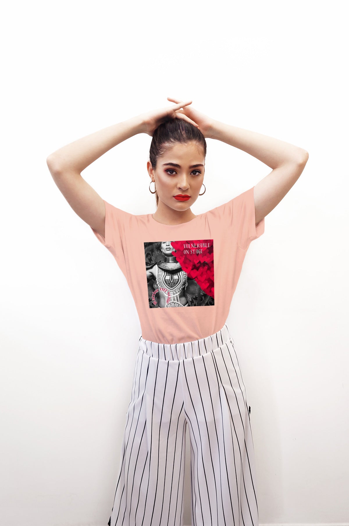 A bold and stylish Unisex Artist Vulnerable Warrior T-Shirt in Classic design, specifically crafted for Black Female Artists (BFA). The shirt features empowering graphics, celebrating authenticity on stage and fierce warrior strength off stage. Perfect for making a statement in the world of art and beyond.
