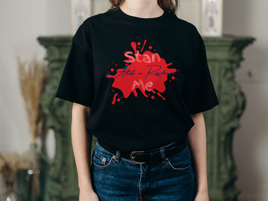 “Stan Me, Artist in Residence” tees featuring paint splatter designs, blending artistic creativity with stan culture. Available in 8 unique styles. Perfect for artists looking to attract fans and gigs.