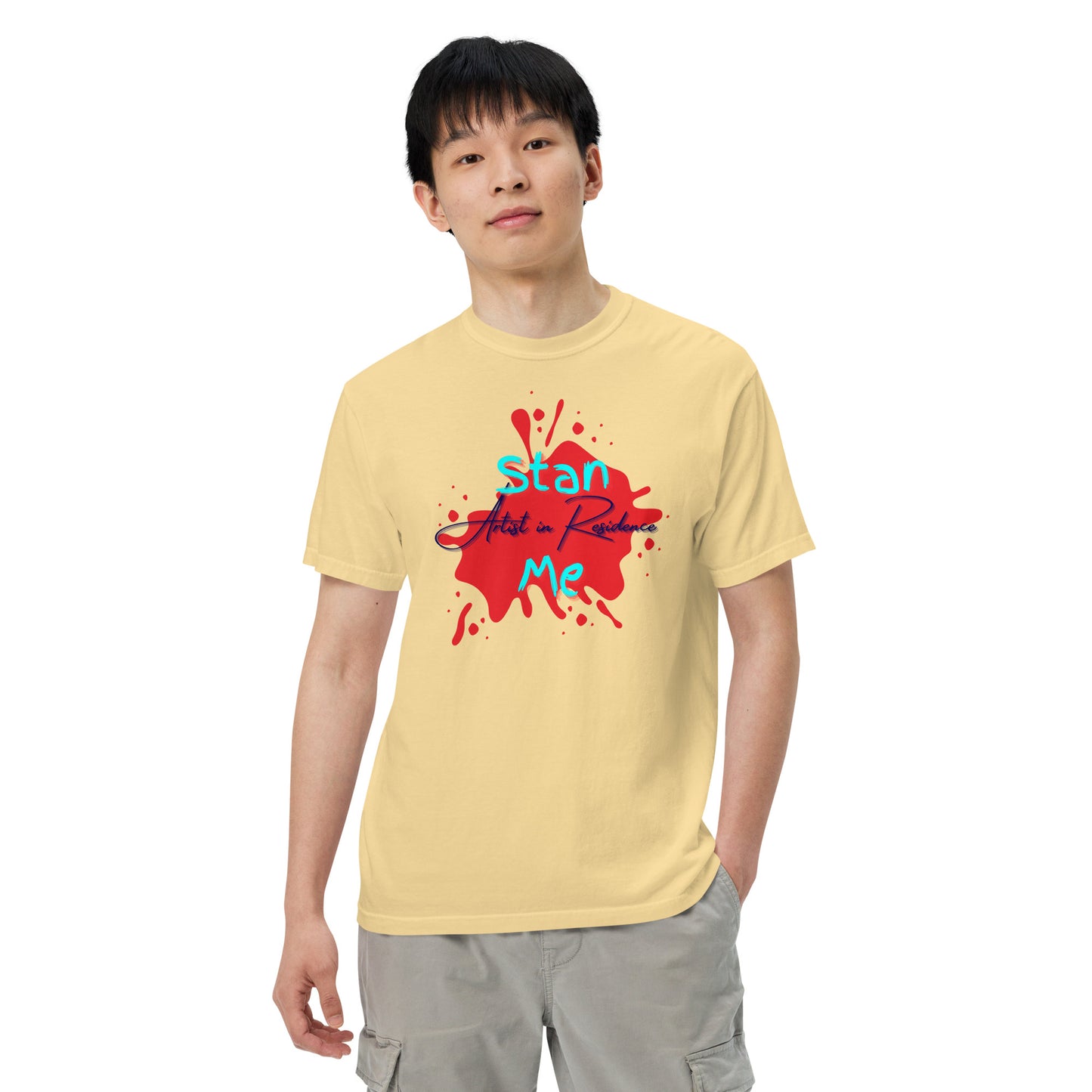 “Stan Me, Artist in Residence” tees featuring paint splatter designs, blending artistic creativity with stan culture. Available in 8 unique styles. Perfect for artists looking to attract fans and gigs. yellow tee