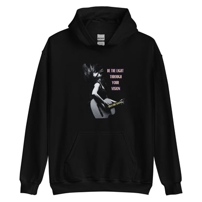 A stylish black and white Heavyweight Be the Light Unisex Hoodie displayed against a backdrop of creativity. The bold graphics symbolize authenticity, inviting artists to embrace their vision and be the light for their audience.