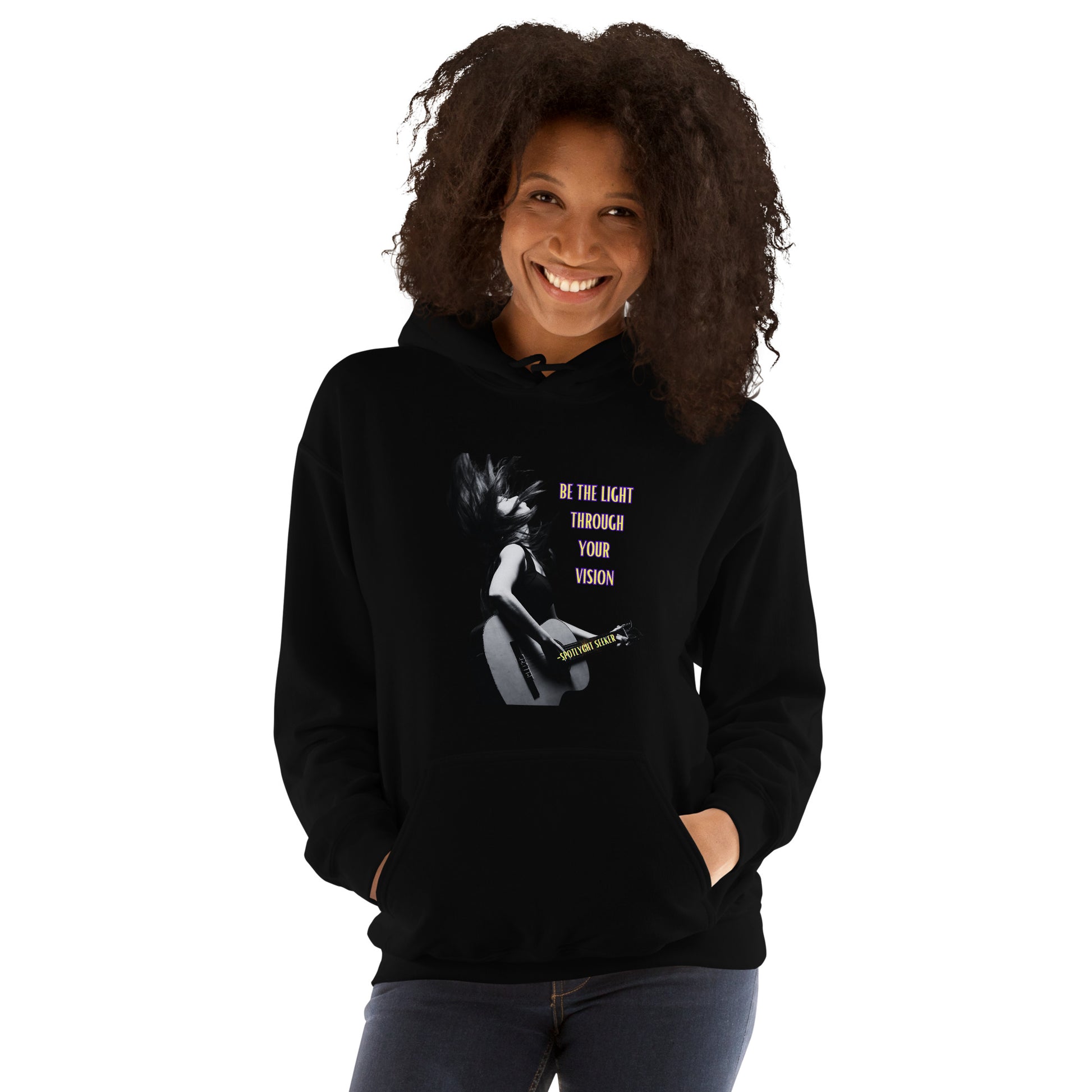 A stylish black and white Heavyweight Be the Light Unisex Hoodie displayed against a backdrop of creativity. The bold graphics symbolize authenticity, inviting artists to embrace their vision and be the light for their audience.