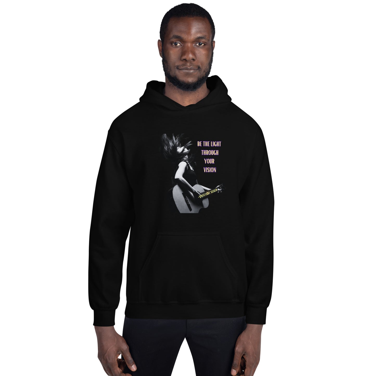 A stylish black and white Heavyweight Be the Light Unisex Hoodie displayed against a backdrop of creativity. The bold graphics symbolize authenticity, inviting artists to embrace their vision and be the light for their audience.