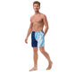 Dedicated artists wearing vibrant Ride the Wave Swim Trunks, embodying the artistic journey's highs and lows with the passion that drives their creativity. Embrace the ups and downs with SpotlYght Seeker's inspirational blend of style and support at the beach.