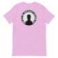 Back view of an LBS Colored T-Shirt with the text: ‘And the Spotlight Will Follow,’ symbolizing how leading with your best self draws attention and success. Lilac