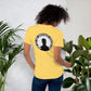 Rear design of an LBS Colored T-Shirt with the message: ‘And the Spotlight Will Follow,’ a nod to the power of leading with your best self and inspiring others.
